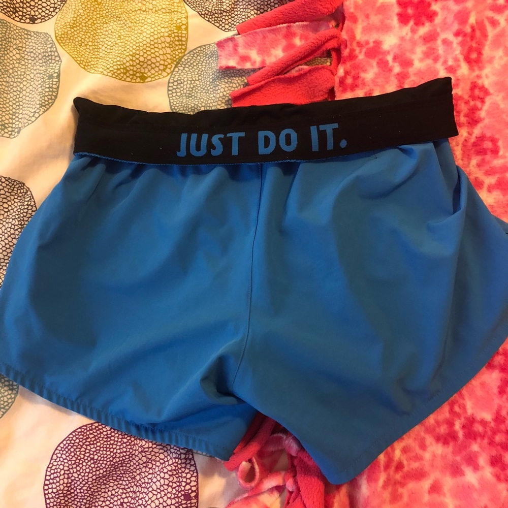 Baby blue NIKE shorts with spandex